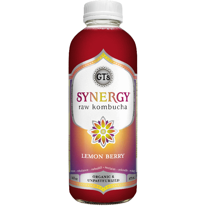 A glass bottle of berry colored kombucha, GT's Synergy Lemon Berry Organic Raw Kombucha.